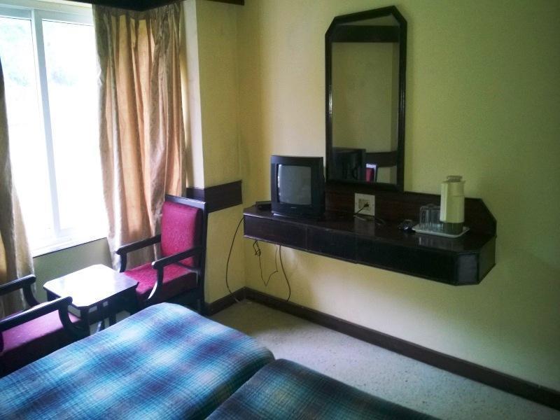 Hotel New Rajdarshan Madikeri Exteriör bild